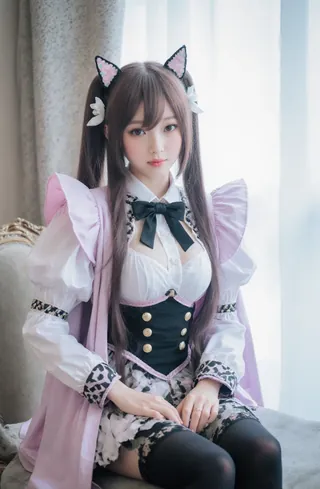 Cosplayer in elaborate fantasy costume with cat ears and tail, posing for photo.
